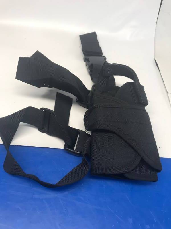 lot 3174 image: TRACTICAL HAND GUN HOLSTER