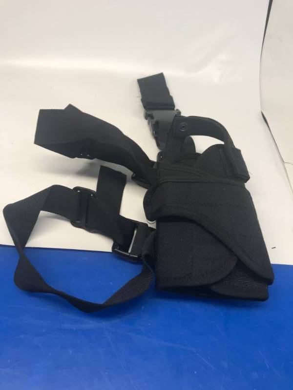 lot 3175 image: TRACTICAL HAND GUN HOLSTER