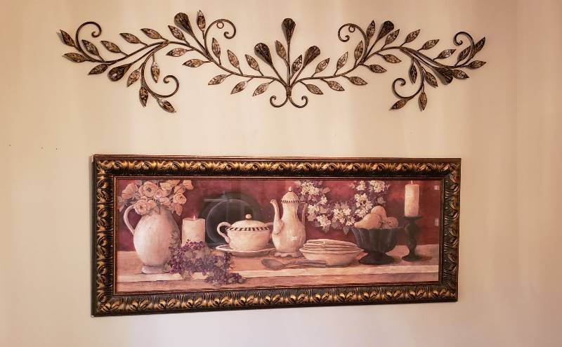 lot 1288 image: Lot of Wall Decor - Framed Still Life Print, Metal Wall Decor, and a Pair of Metal Wall Candle Sconces