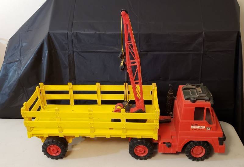 lot 1309 image: Vintage Tuff Boy 6 Motorized 6 way Truck - 3 Pieces