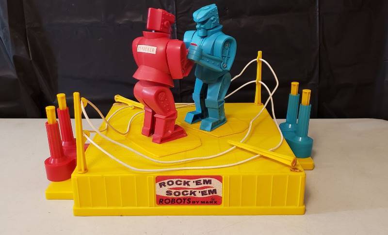 lot 1312 image: Vintage Rockem Sockem Robots by Marx - works - 2 of the Ring Posts will need repaired