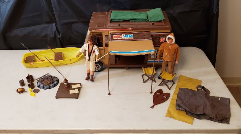 lot 1328 image: Vintage Big Jim Sports Camper with 2 Big Jim Dolls and numerous accessories