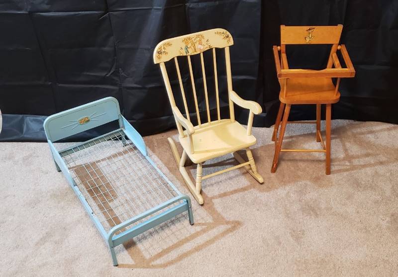 lot 1354 image: Vintage Doll Furniture - Metal bed, wood rocker, and wood high chair