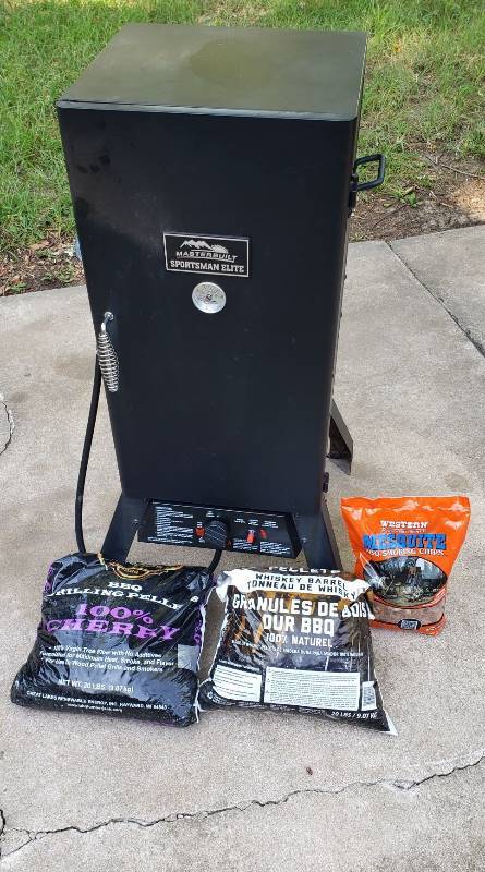 lot 1445 image: Master built Sportsman Elite Propane Smoker with 3 Bags of Smoking PelletsChips - 20  x 19  x 40