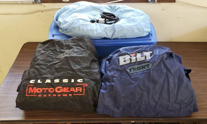 lot 1497 image: Lot of 3 Motocycle Covers, Bell Cable Lock with Key, and Storage Tote