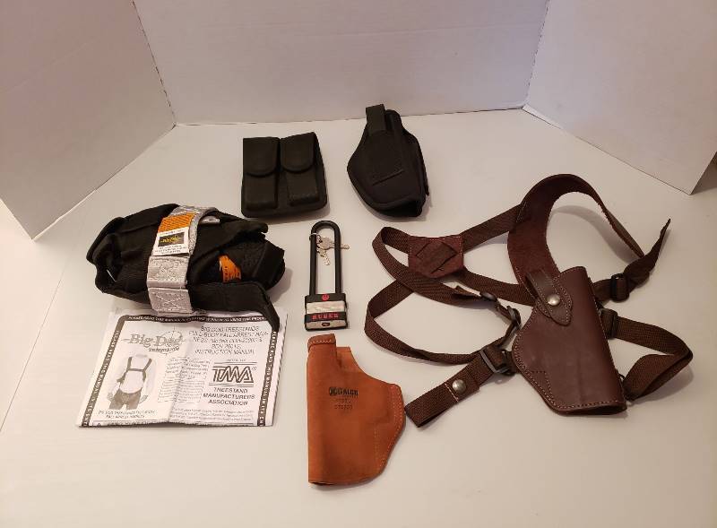 lot 1551 image: Lot of Pistol Holsters and Gun Lock