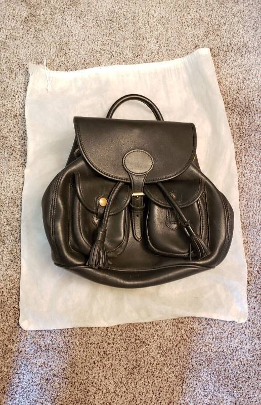 lot 1588 image: Dooney & Bourke Black Leather Back Pack - Unknown Authenticity