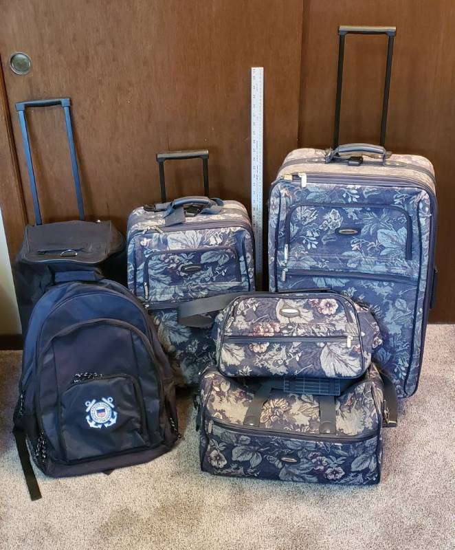 lot 1622 image: Lot of 4 piece Luggage Set by Jaguar, Protege Rolling Gym Bag, and Coast Guard Backpack