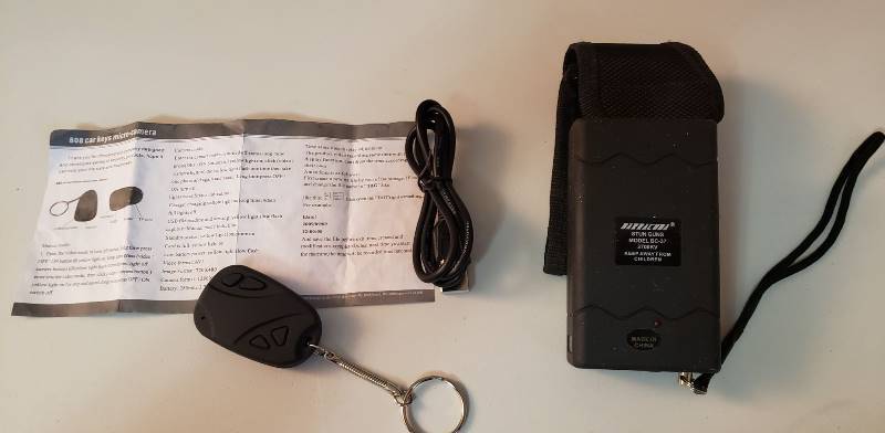 lot 1633 image: Barracuda Stun Gun Model BC-37 (2 x4 x1 )with case and Key Chain Micro-camera