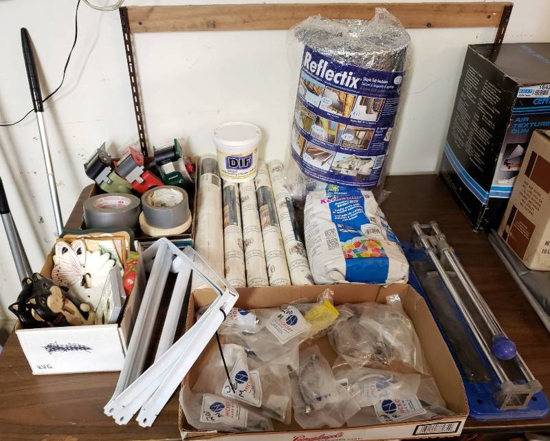 lot 1644 image: Lot Home Improvement Tile Cutter, Grout, Reflectix Insulation, Tape Guns and More