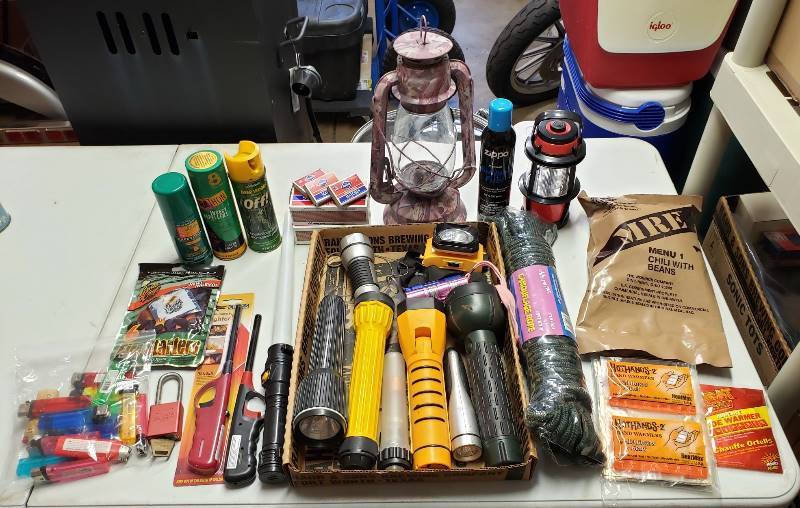lot 1653 image: Lot of Flashlights, Lantern, Rope and Lighters