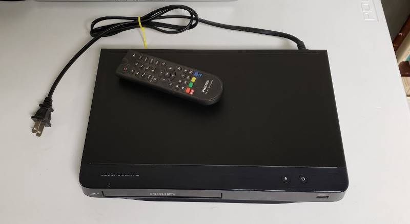 lot 1727 image: Phillips a-Day DVD Player with Remote - powers on