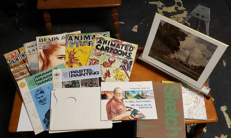 lot 1739 image: Vintage Art Manuals, Supplies includes Fold-up Metal Easel, and Print - tote included