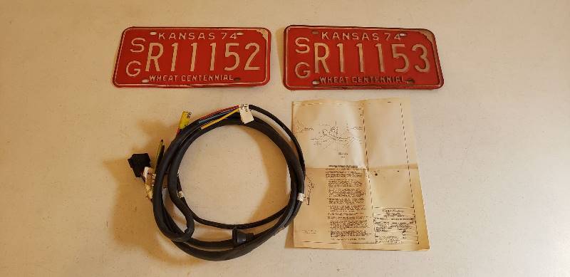 lot 3037 image: Lot of 1974 KS License Plates (2) and Ford 1974 Trailer Lamp Plug and Wiring Kit