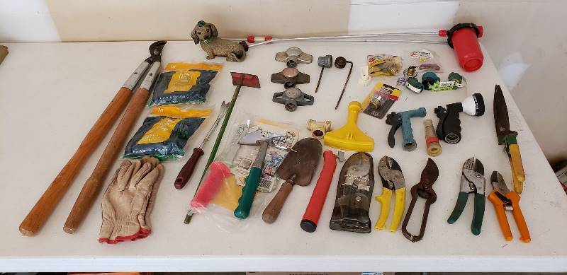lot 3044 image: Lot of Lawn Care Items - Pruners, Sprinklers, and Tools