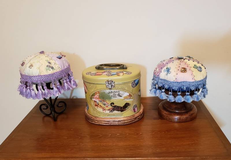 lot 3163 image: Handmade Pin Cushions and J&P Coats Storage Box