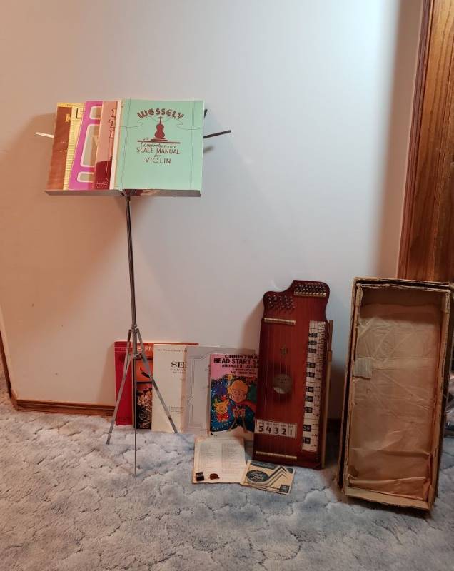 lot 3187 image: Antique Original Wood Pianoette Pionolin with Original Box, Pick Tool & Bow with Music Stand and Sheet Music