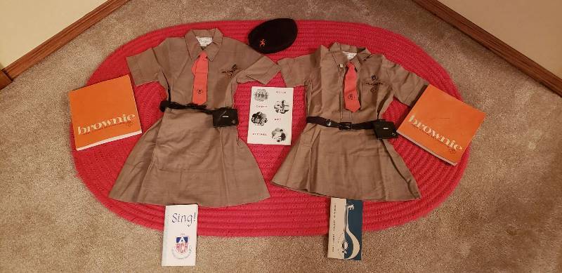 lot 3196 image: Vintage BrowniesGirl Scout Uniforms and books