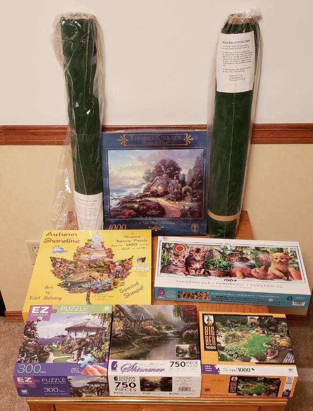 lot 3217 image: Lot of 6 Puzzles and 2 Jigsaw Roll Up Mats