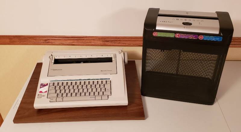lot 3219 image: Electric Smith Corona Typewriter, Embassy Paper Shredder, and Wood Lazy Susan - under typewriter - Electric Items Work