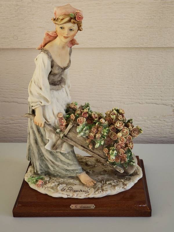 lot 3305 image: G. Armani Italian Figurine - Lady with Rose in Wheelbarrow 1981