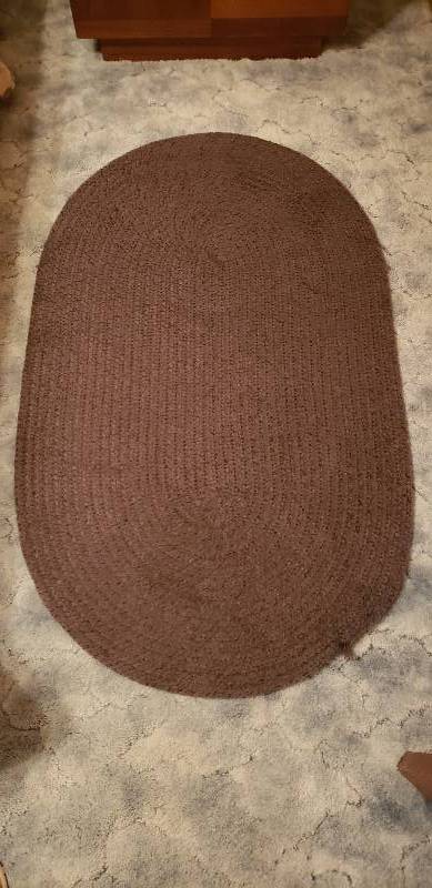 lot 3015 image: Plum colored Oval Braided Rug - 50  x 30