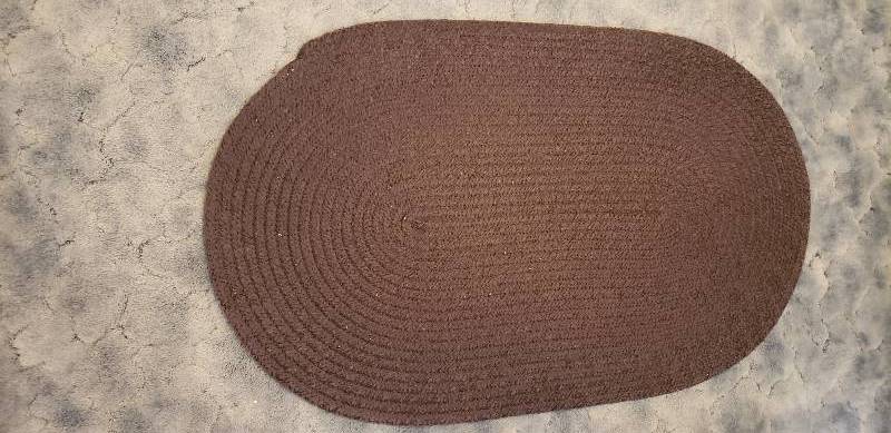 lot 3016 image: Plum colored Oval Braided Rug - 50  x 30