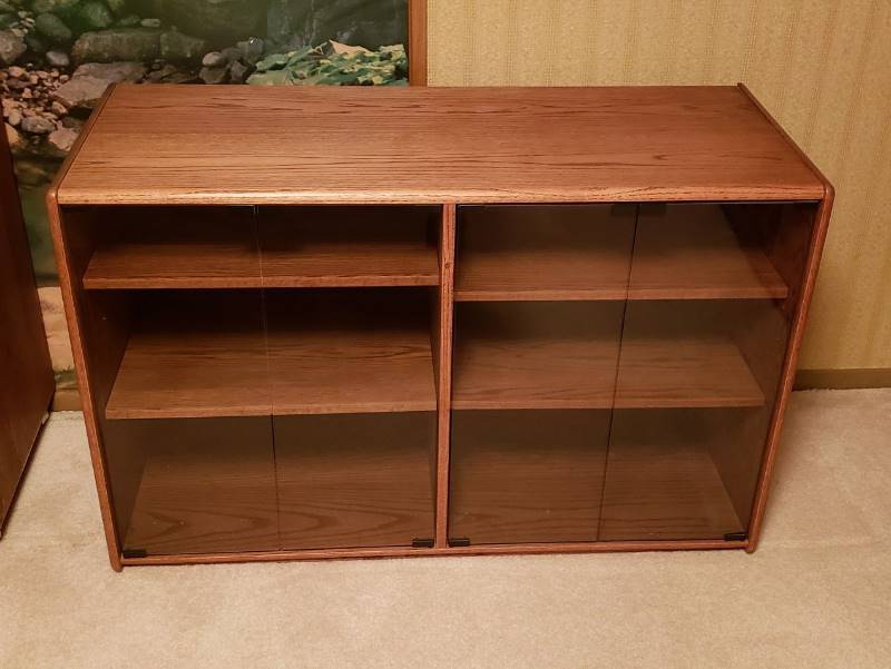 lot 2206 image: Custom Woodwork & Design Solid Wood 4 Glass door Cabinet - comes with Casters and Wood Base in Box - 48 in. x 19 in. x 30 in.