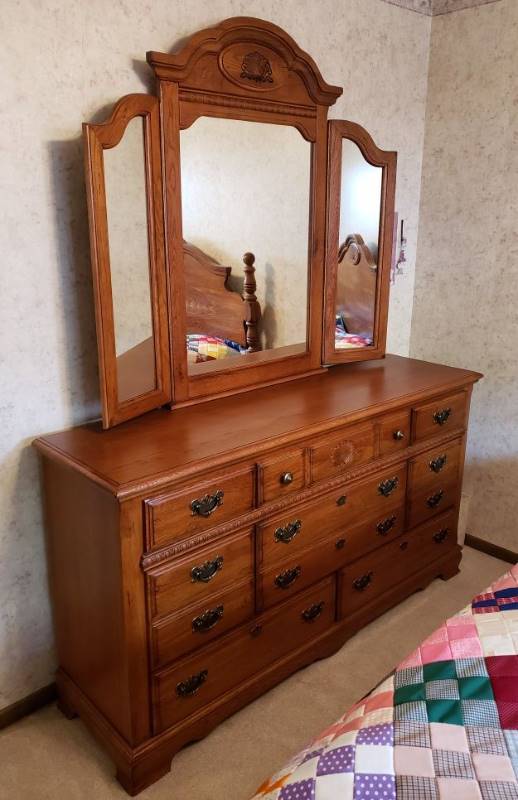 lot 2234 image: Scallop Design Wood 8 Drawer Dresser with Folding Sides 3 Panel Mirror - Dresser 64 in. Wide and Mirror 52 in. wide & 46 in. tall