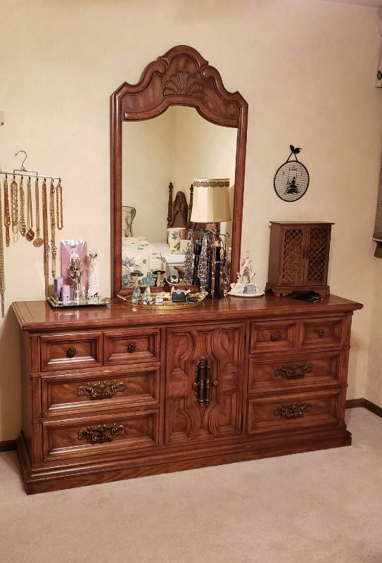 lot 2241 image: Dark Wood Scallop Design 9 Drawer Dresser with Mirror - Dresser 70 in. Wide and Mirror 29 12 in. x 51 in. Contents Not Included