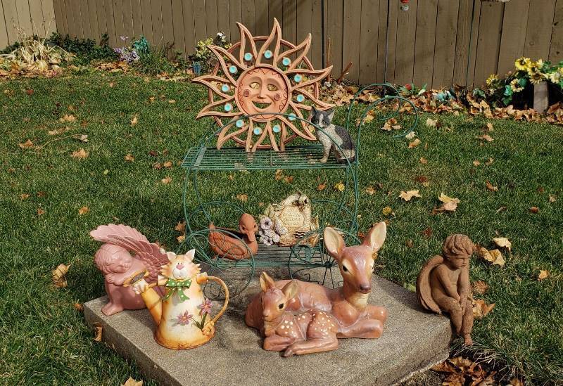 lot 2252 image: Lot of Assorted Outdoor Decor - Metal Plant Cart, Angels, Cats, Deer, and Others - some may have chip or cracks