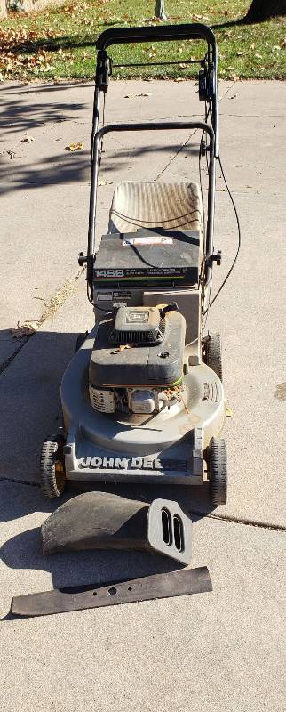 lot 2269 image: John Deere 14SB - 21 in. cut Mower 5.0 hp OHV 5 speed - Bag, Mulching Attachment, and extra blade - Runs  Mows