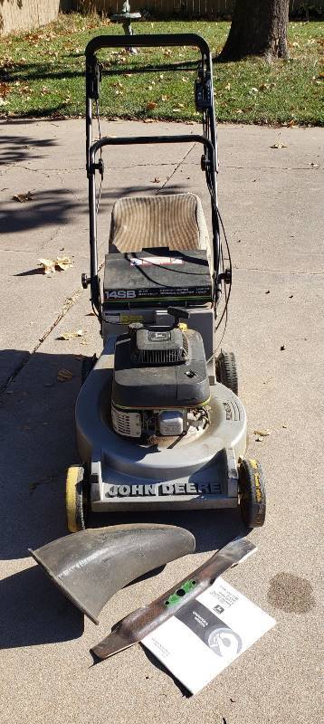 lot 2270 image: John Deere 14SB - 21 in. cut Mower 5.0 hp OHV 5 speed - Bag, Mulching Attachment, and extra blade - Runs  Mows
