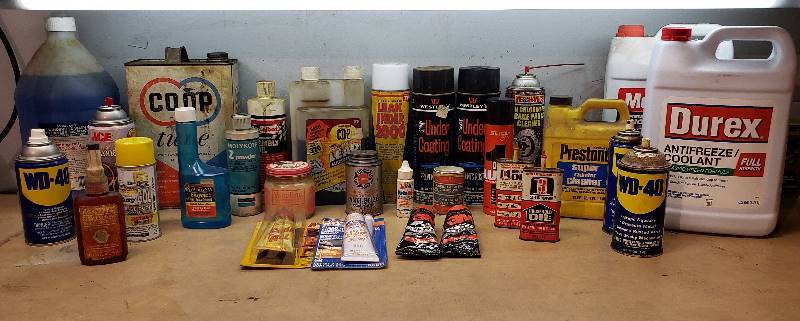 lot 2333 image: Lot of Automotive Fluids, Lubes, and Sealants - most containers are over half full