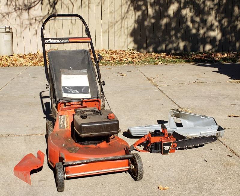 lot 2411 image: Lot of Ariens LM21 Push Mower (21 in.) and Remington 34 cc Mighty Mite 14in. Chainsaw - Both have issues -could be used for parts