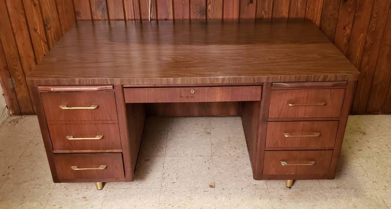 lot 2461 image: Dark Wood Executive Type Desk with Wood Grain Formica Top - 60 in. x 36 in. x 29 in. - Located in Basement