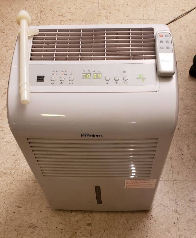 lot 2477 image: Danby Premiere Dehumidifier with Remote - 15 in. x 12 in. x 24 in.- powers on, unknown if condenser works