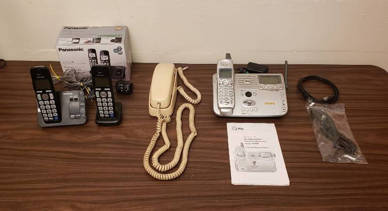 lot 2505 image: Lot of 3 Different Phones - Panasonic Digital Cordless Answering System, Princess Wall Phone, and AT&T 5.8 GHz Cordless TelephoneAnswering System