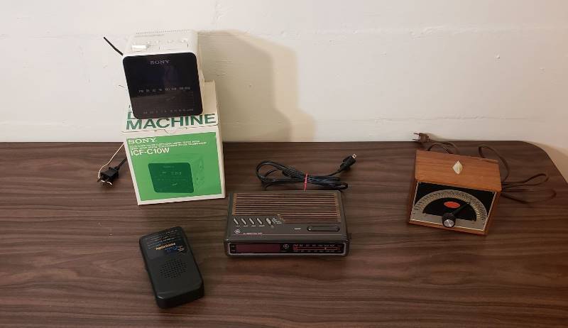 lot 2528 image: Sony Dream Machine, Franz Electric Metronome, GE Clock Radio , and Popular Science Radio - all work