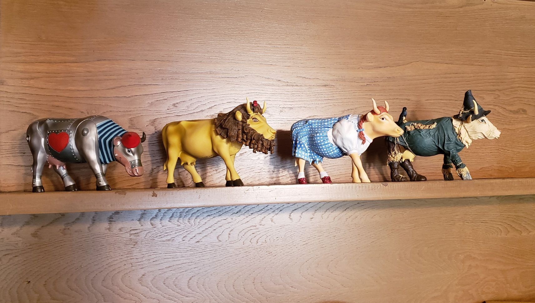 lot 2546 image: Lot of (4) Cow Parade Wizard of Oz Westland Figurines