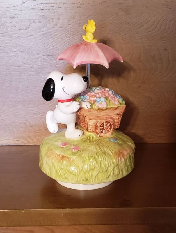 lot 2553 image: Schmid Snoopy Peanuts Music Box Younger than Spring Times Umbrella Flower Cart