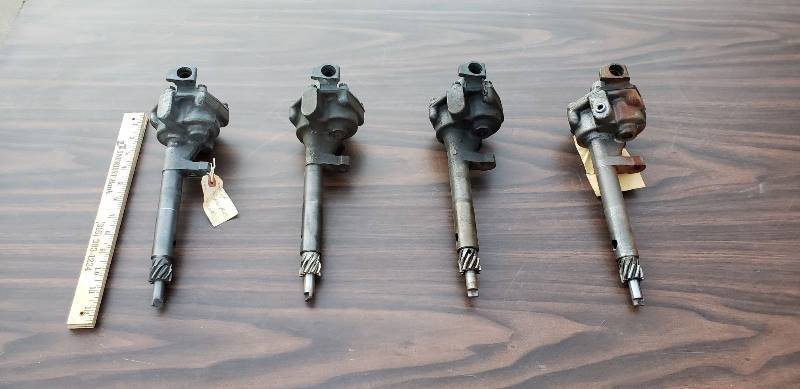 lot 2569 image: Kaiser 1950s Car Parts - 4 Oil Pumps & 2 Oil cooling condensers