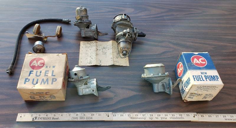 lot 2571 image: Kaiser 1950s Car Parts - Fuel Pumps - 3 Kaiser  1 Chevy