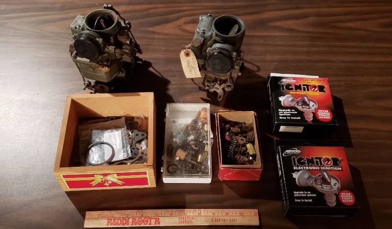 lot 2594 image: Kaiser 1950s Car Parts - 2 carburetors with partsgaskets and 2 ignitors