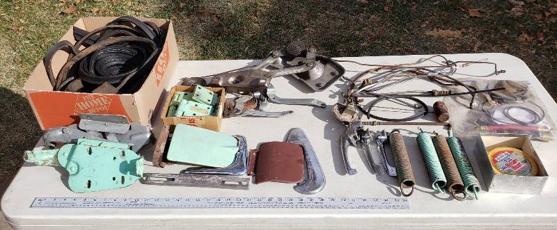 lot 2612 image: Kaiser 1950s Car Parts - Various Hinges, Fuel Tank Float, Fuel Lines, Springs, and Weather stripping