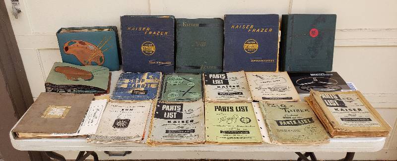 lot 2616 image: Kaiser 1950s Car Manuals, Bulletins, Parts List, and Fabric Samples