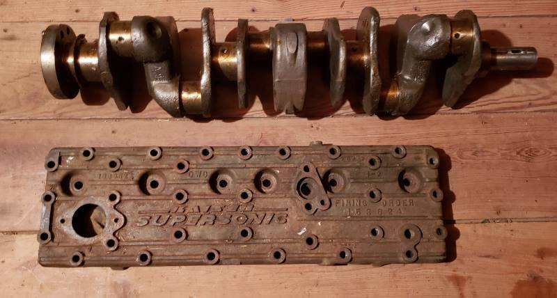 lot 2619 image: Kaiser 1950s Car Parts - Kaiser Supersonic Engine Block Cover and Camshaft #734542 - in Garage Attic