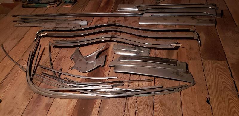 lot 2623 image: Kaiser 1950s Car Parts - Exterior Body Chrome Molding - Numerous Pieces - in Garage Attic