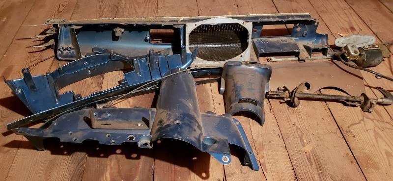 lot 2628 image: Kaiser 1950s Car Parts - Dashboard Metal Parts, Control Cabling, and Emergency Brake Handle - in Garage Attic
