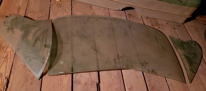 lot 2632 image: Kaiser 1950s Car Parts - 1954 Rear Window Glass - 3 pieces - in Garage Attic